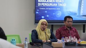 Dr. Umamatul Bahiyah menyampaikan laporan pelaksanaan Workshop Digitalisasi Manajemen Risiko